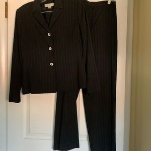 Pant suit by petite sophisticate, jacket size 4 and pants size 2.